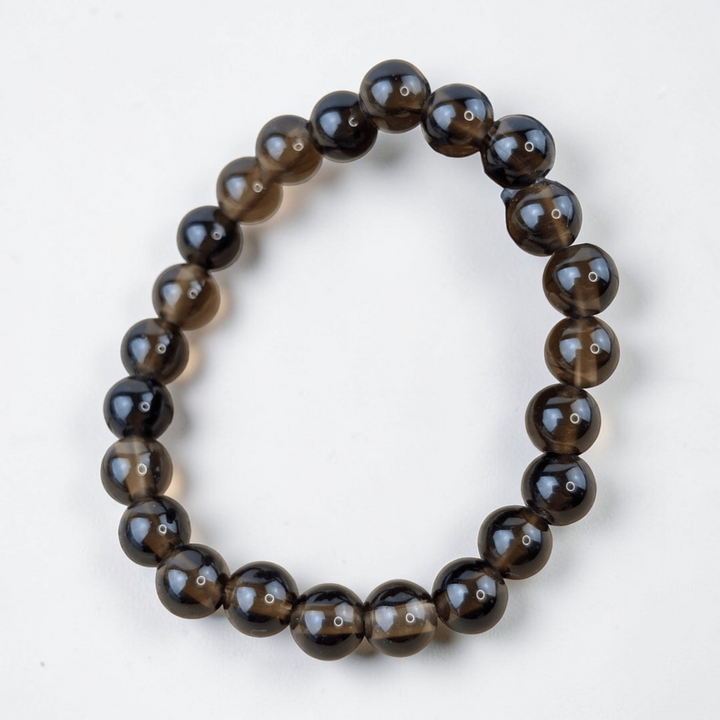 Smoky quartz bracelet for root chakra support. Available at Zen Collection Metaphysical Store. Shop no in-store or online