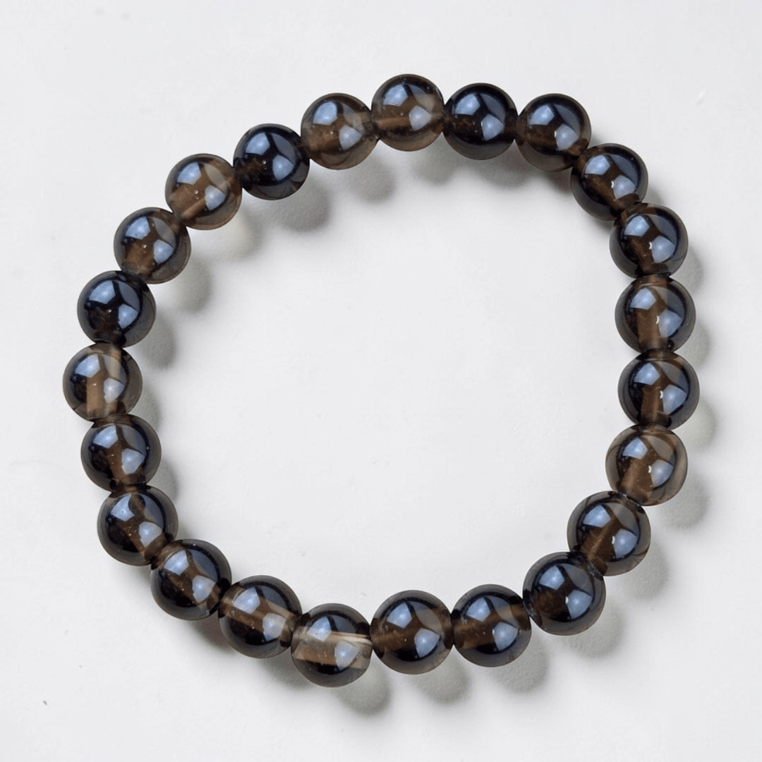 Smoky quartz bracelet for root chakra support. Available at Zen Collection Metaphysical Store. Shop no in-store or online