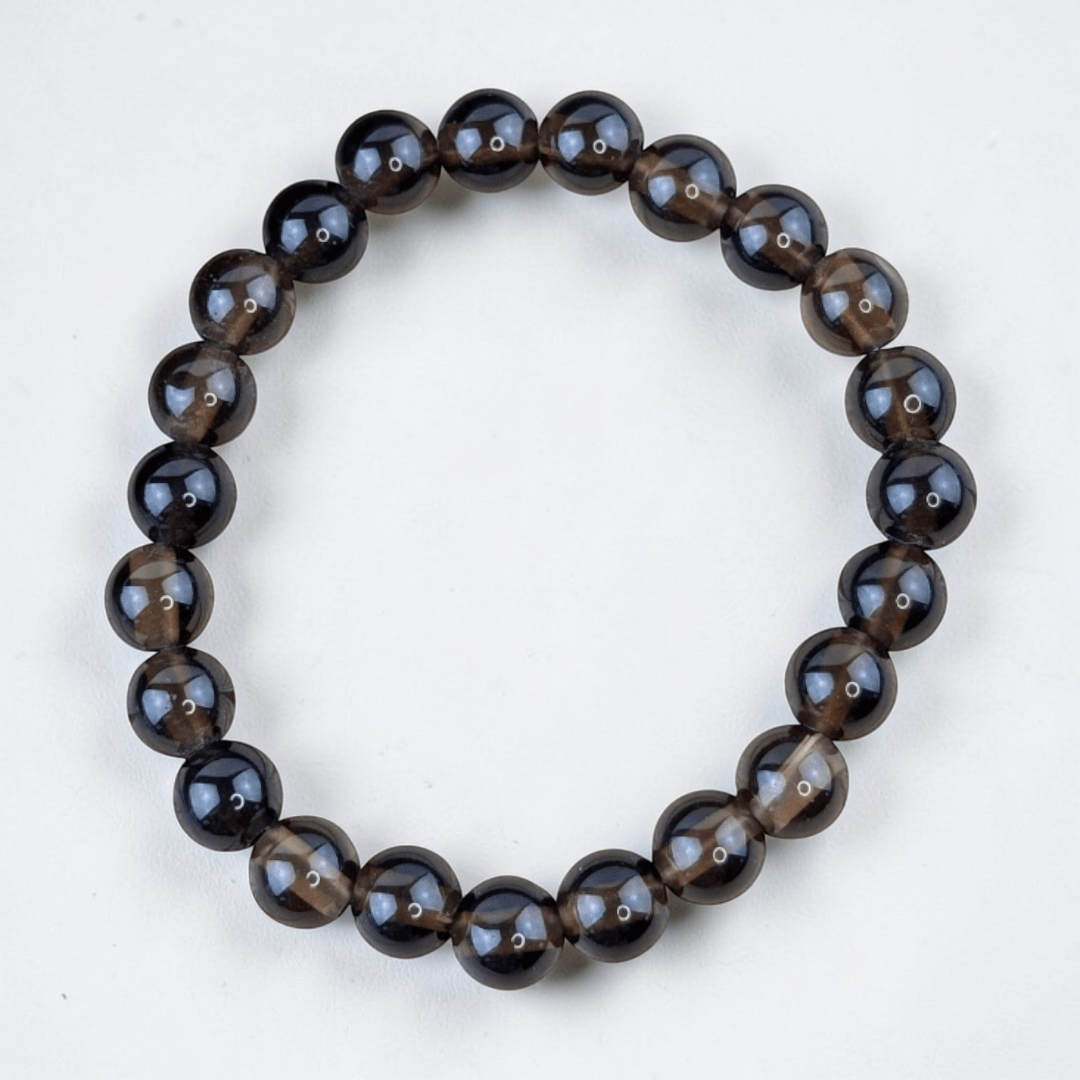 Smoky quartz bracelet for root chakra support. Available at Zen Collection Metaphysical Store. Shop no in-store or online