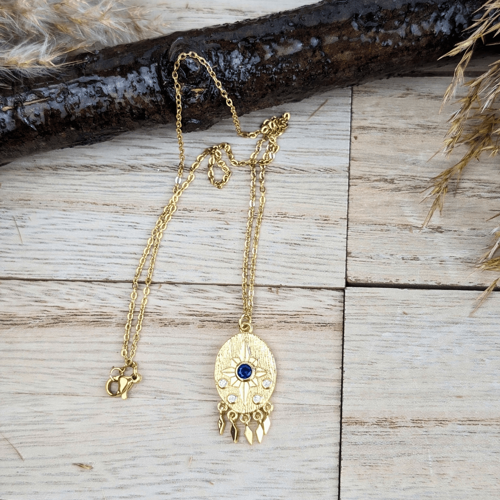 Soul Reflection Pendant with a blue rhinestone and protective charm, symbolizing clarity and authenticity