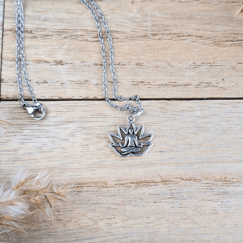 Stillness Within Necklace with a silver-tone lotus flower pendant