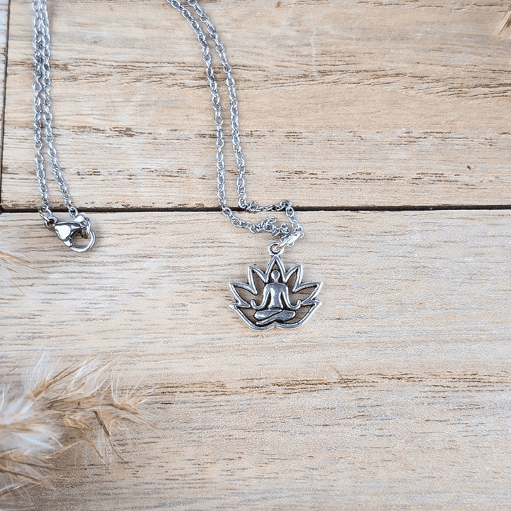 Stillness Within Necklace with a silver-tone lotus flower pendant