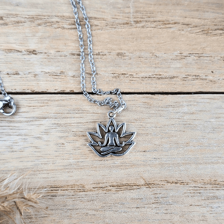 Elegant necklace featuring a silver lotus design symbolizing mindfulness