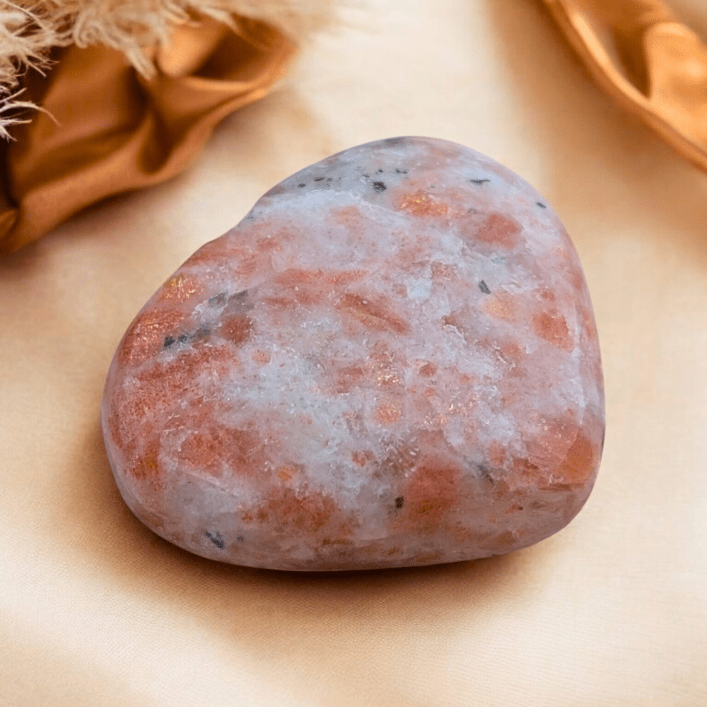 Sunstone Crystal Heart hand-carved with golden hues.