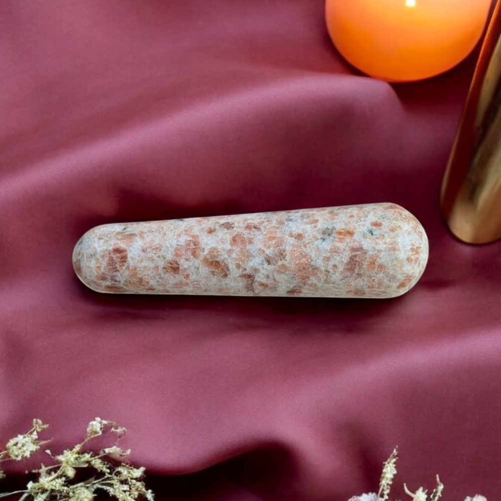 Sunstone Crystal Wand showcasing vibrant orange and gold hues.