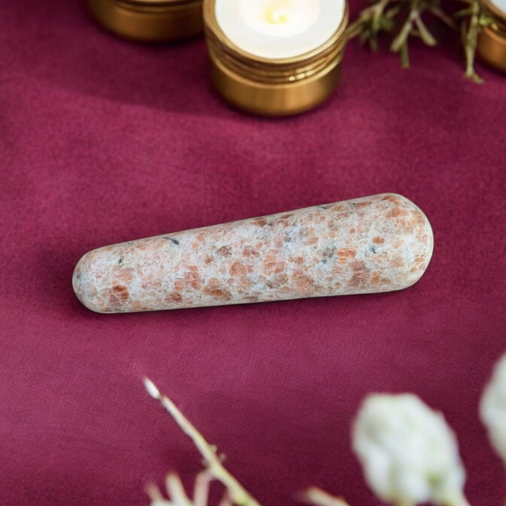 Polished Sunstone Wand with shimmering natural inclusions.