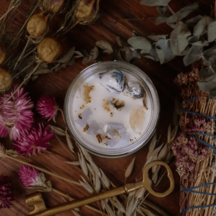 Taurus Candle featuring grounding crystals and uplifting botanicals.