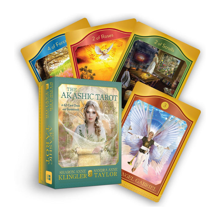 The Akashic Tarot deck box by Sharon Anne Klingler and Sandra Anne Taylor, with four cards