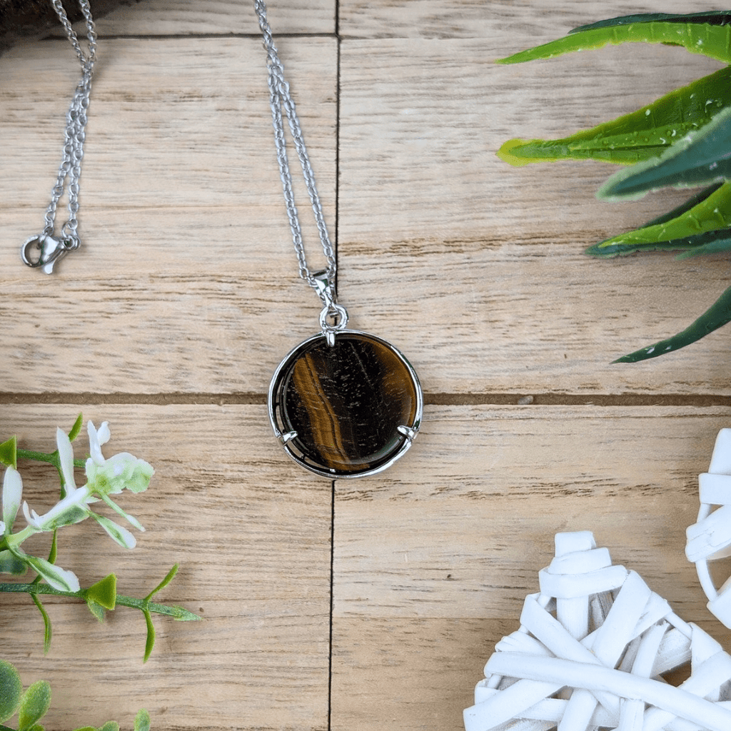 Tigers Eye Celestial Necklace with chain – The Tigers Eye Celestial Necklace displayed with a durable silver chain, perfect for daily wear and spiritual protection.