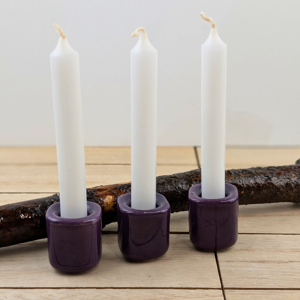 Elegant candle holder in deep violet