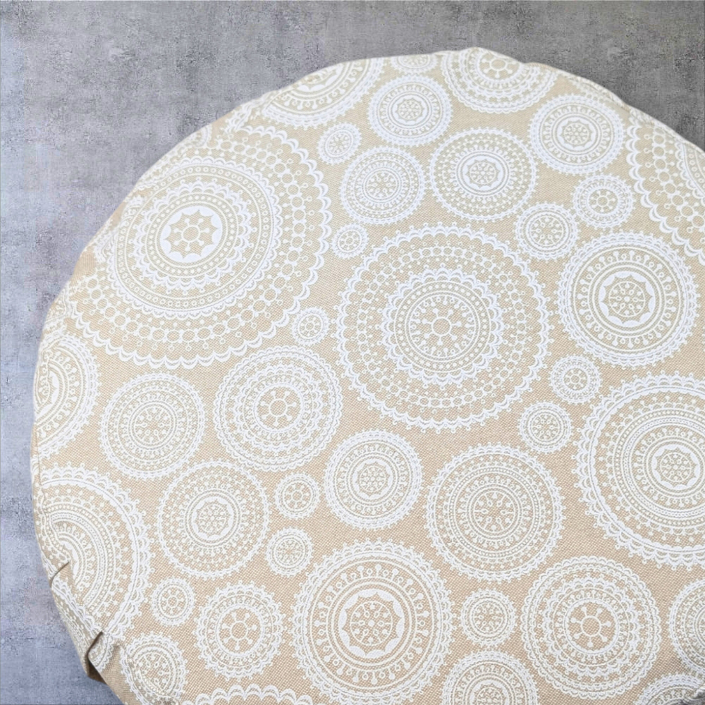 Round yoga meditation cushion for deep breathing.