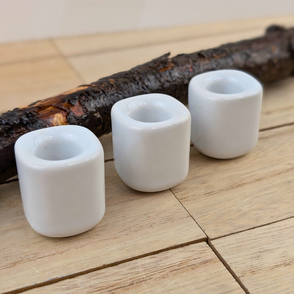 Minimalistic white candle holder for meditation