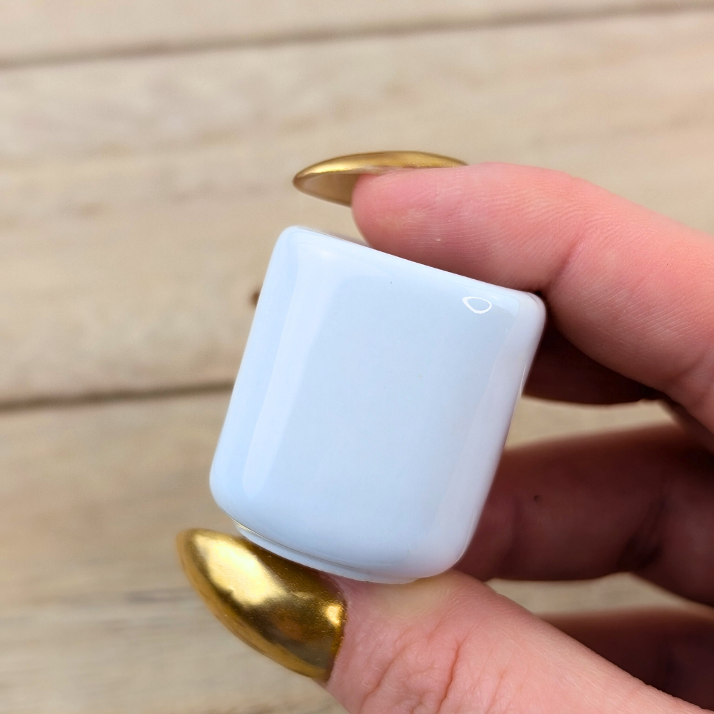 White candle holder for intention-setting rituals