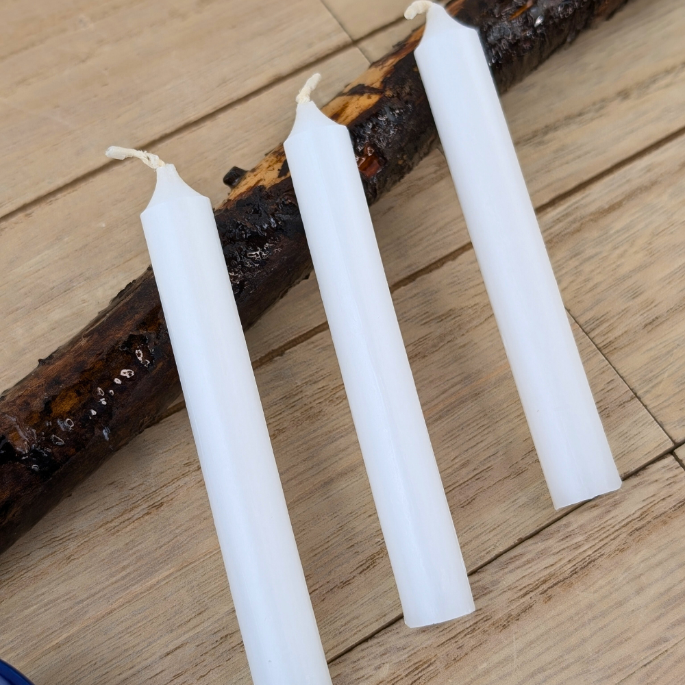 Mini white candles for intention-setting rituals