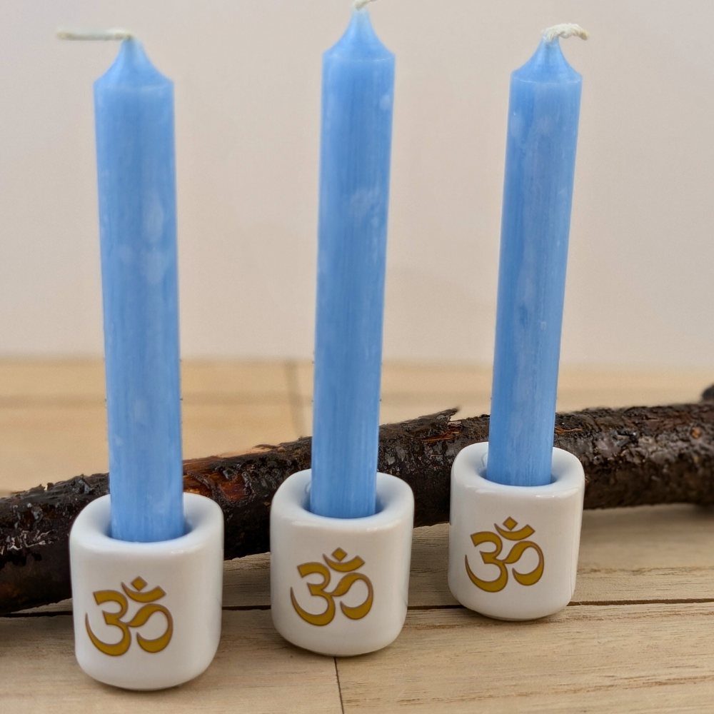 Glossy white candle holder for rituals and meditation