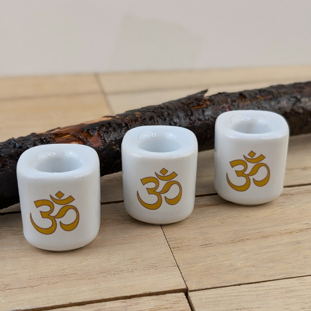 White candle holder for mindfulness and meditation rituals