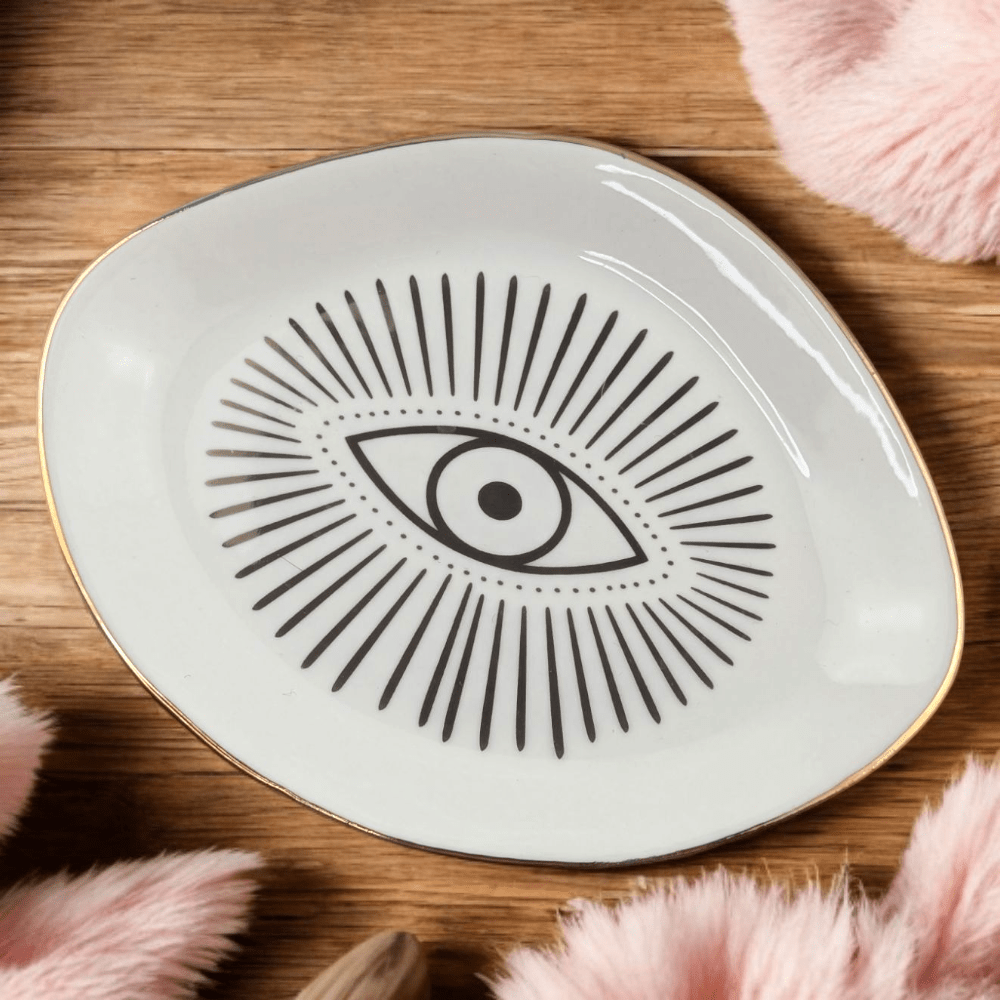White ceramic evil eye jewelry dish