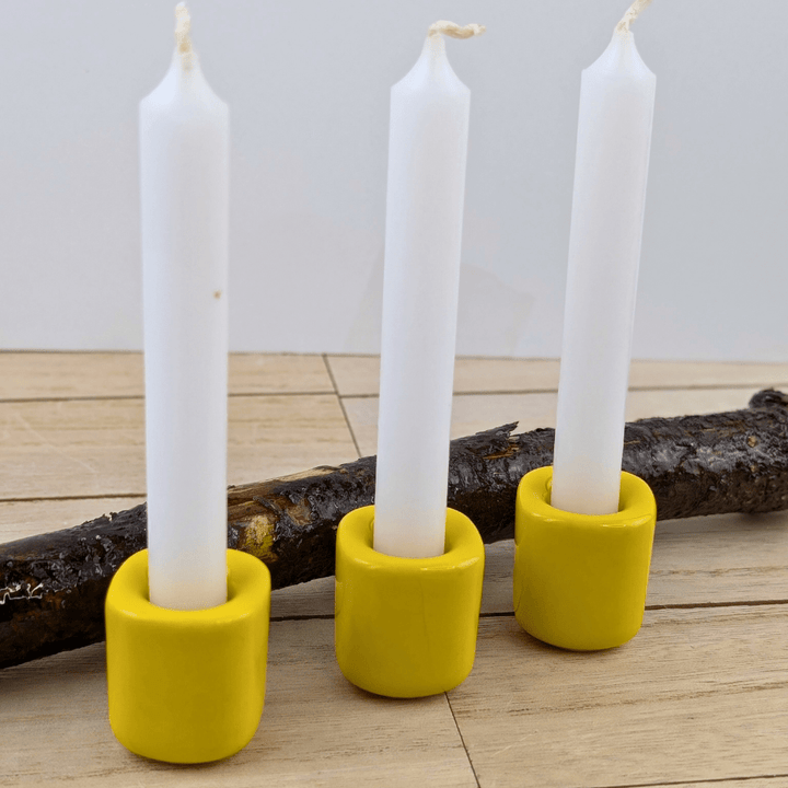 Yellow candle holder for solar plexus chakra work