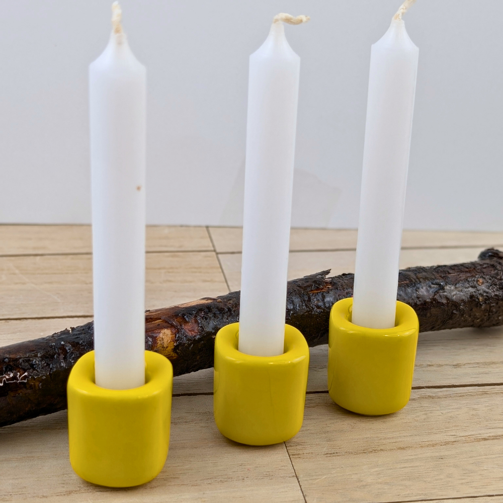 Yellow candle holder for solar plexus chakra work