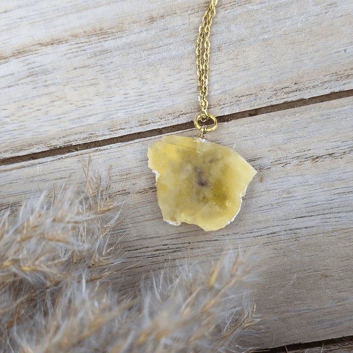 Yellow Opal Necklace with a polished opal pendant on a gold-tone chain