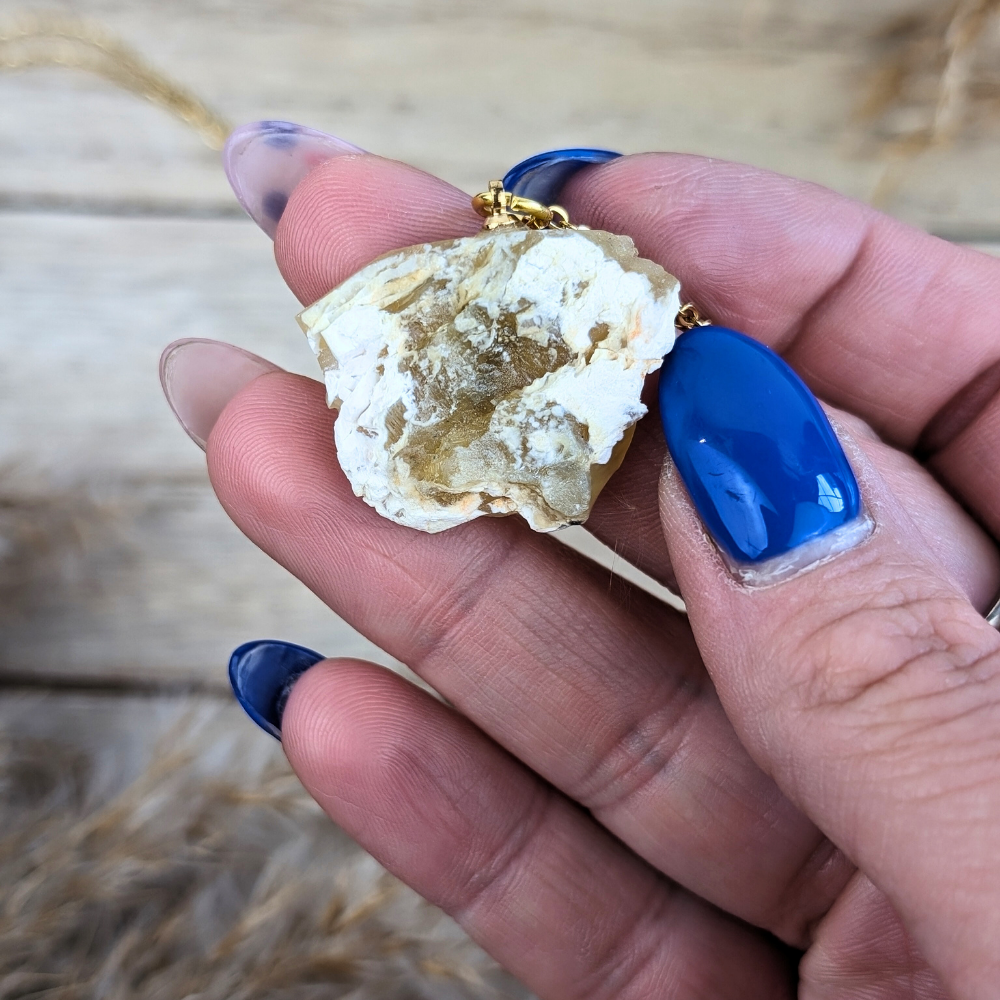 Delicate gold-tone necklace with a natural Yellow Opal pendant.