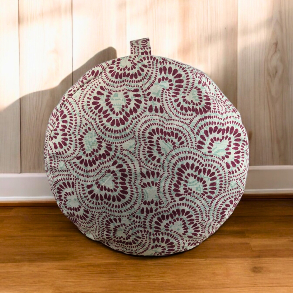 Zen Meditation Pillow with intricate maroon and mint pattern