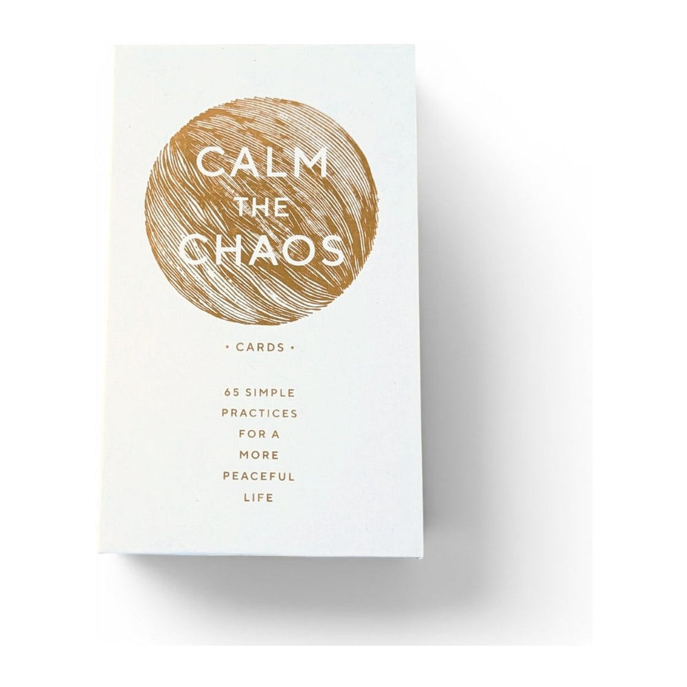 Calm the Chaos cards box front, with a gold circle