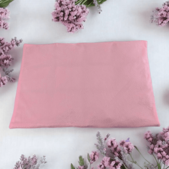 flaxseed filled pink sensory lap pad