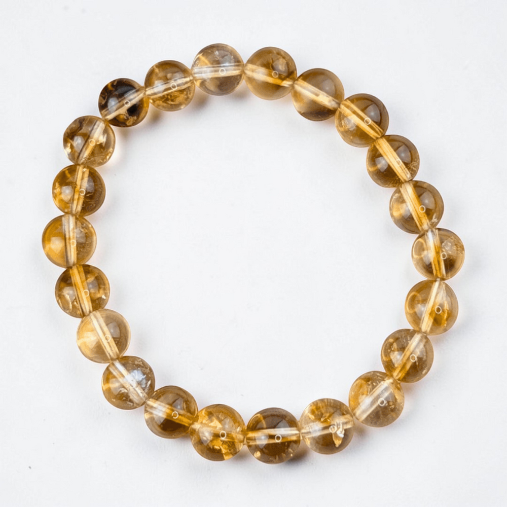 Citrine bracelet with 7mm golden beads available at Zen Collection Crystal Store in Barrie. Shop in-store or online now