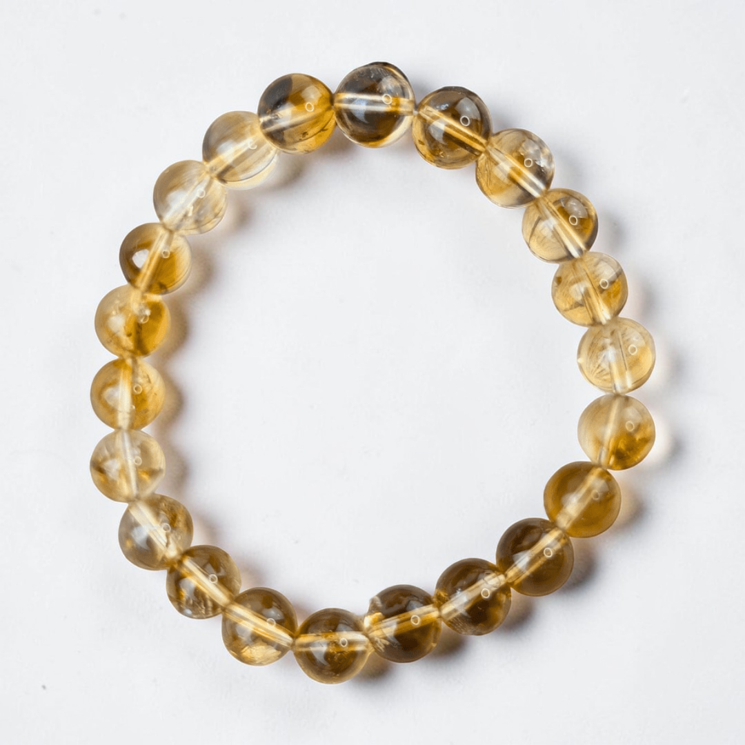 Citrine bracelet with 7mm golden beads available at Zen Collection Crystal Store in Barrie. Shop in-store or online now