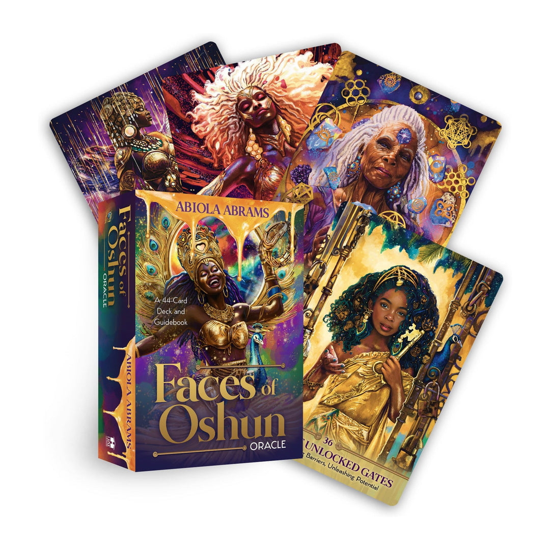 Faces of Oshun Oracle deck box by Abiola Abrams, with four fanned cards