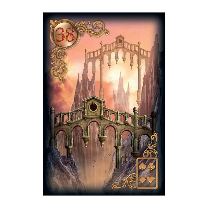 Card 38 from the Gilded Reverie Lenormand Expanded Edition, showing a bridge between cliffs