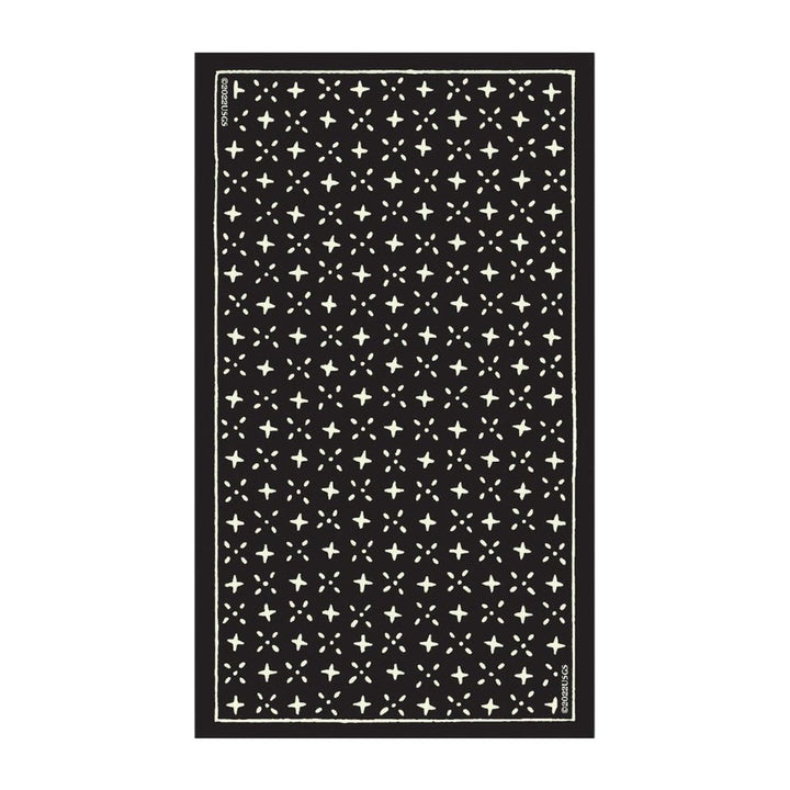 Card back of the Glow in the Dark Tarot, with rows of stars
