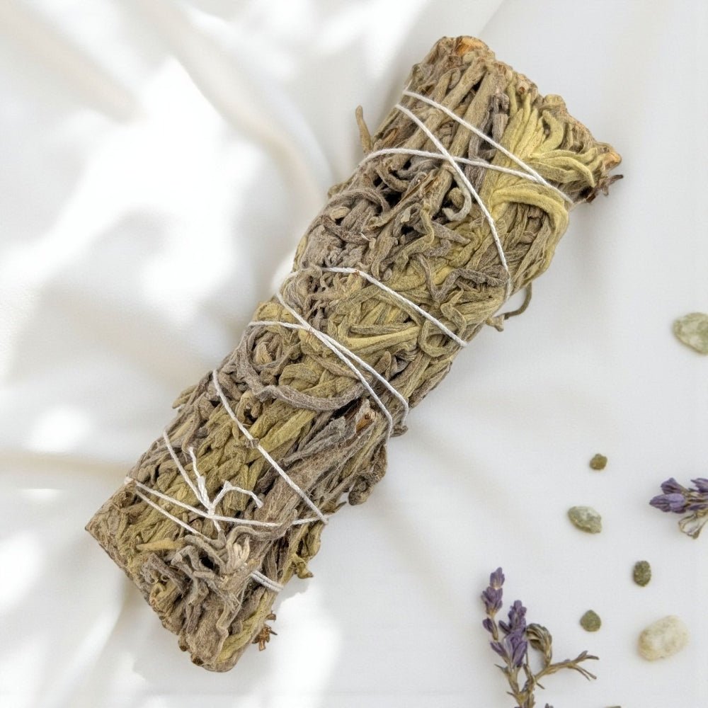 Bundled green sage smudge stick on a white background sourced by zen collection metaphysical store barrie