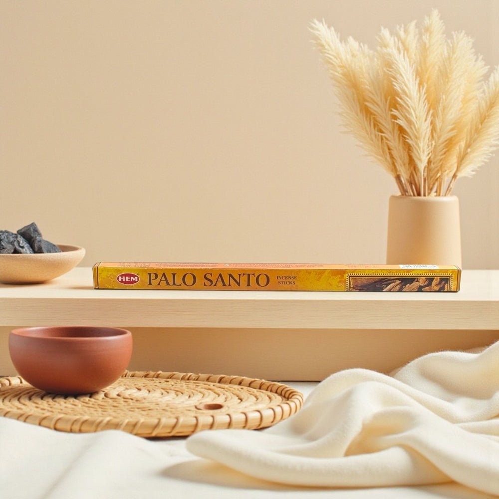 Palo Santo incense with a bowl and woven mat on a neutral background available at zen collection crystal store near me
