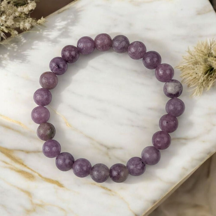Genuine Lepidolite bracelet from Canadian crystal store. Crystals for the crown chakra. Shop in-store or online with Zen Collection