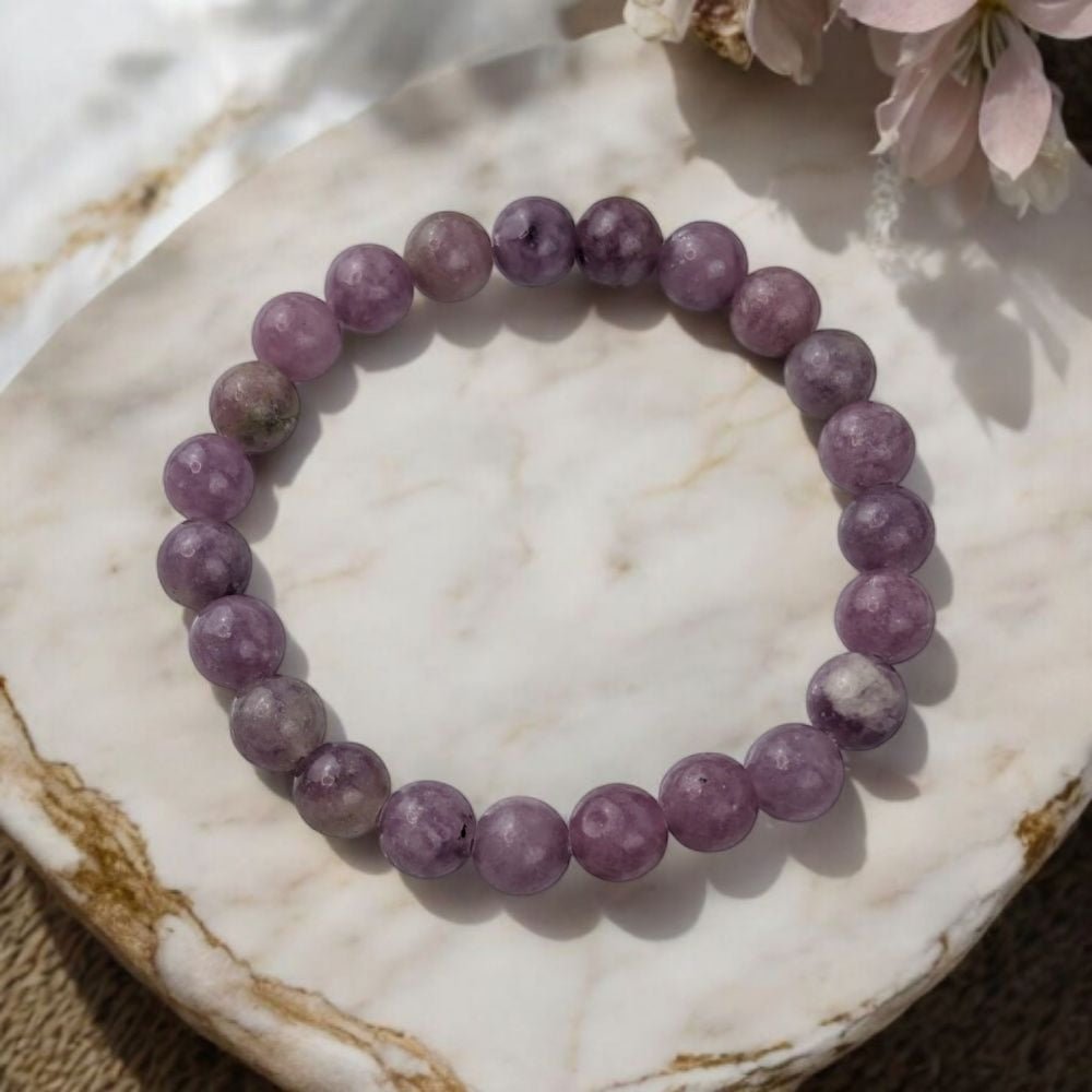 Genuine Lepidolite bracelet from Canadian crystal store. Crystals for the crown chakra. Shop in-store or online with Zen Collection
