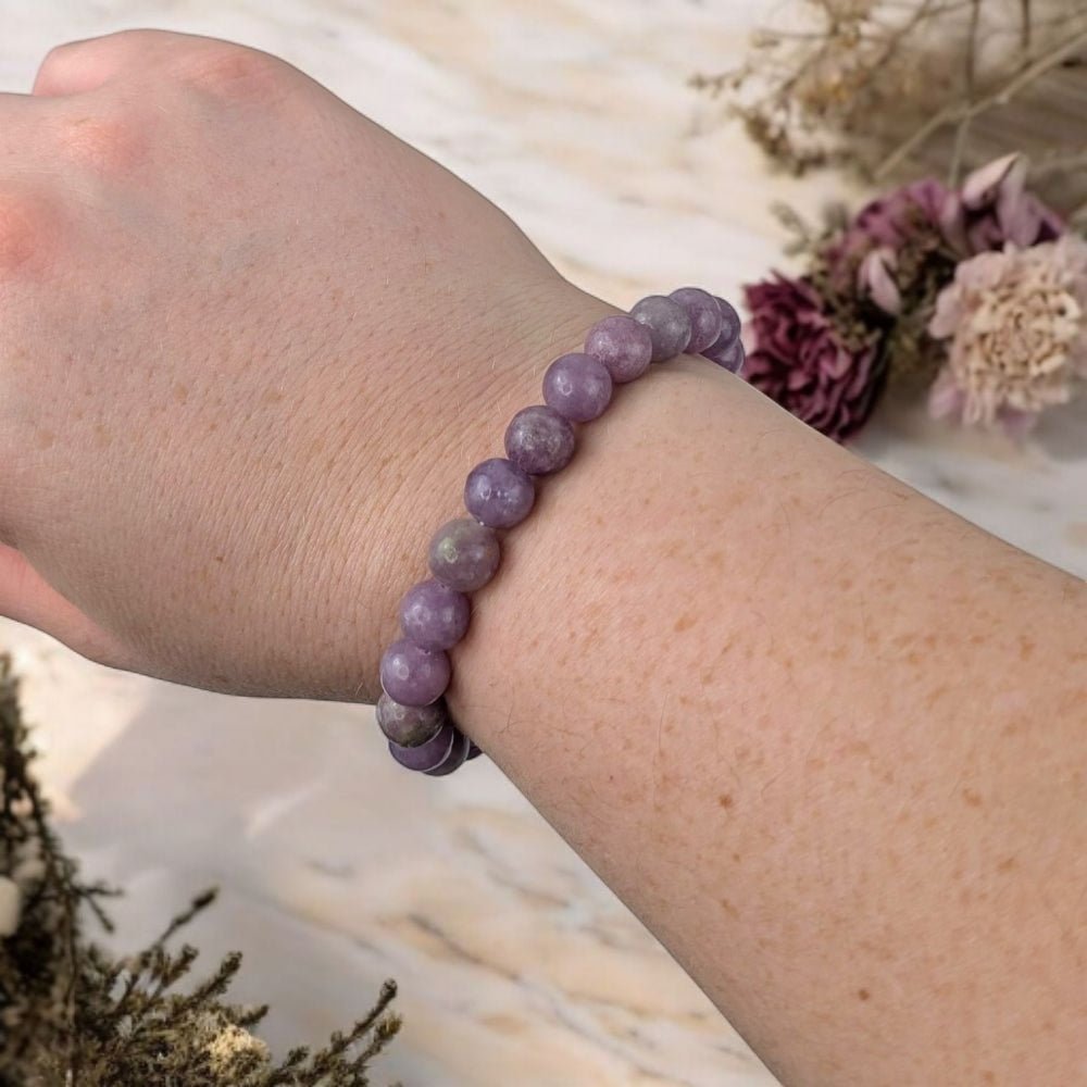 Genuine Lepidolite bracelet from Canadian crystal store. Crystals for the crown chakra. Shop in-store or online with Zen Collection
