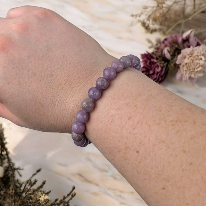 Genuine Lepidolite bracelet from Canadian crystal store. Crystals for the crown chakra. Shop in-store or online with Zen Collection