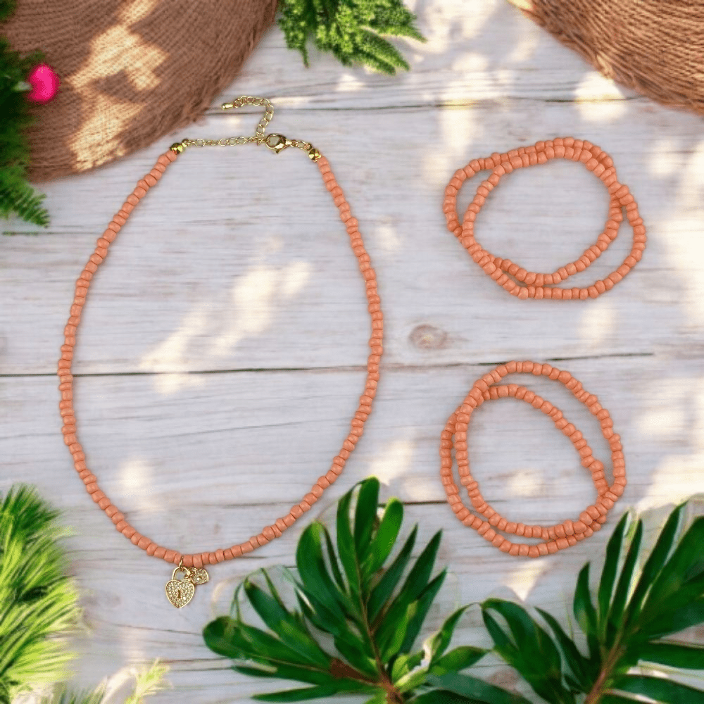 peach seed bead jewelry set with locket

