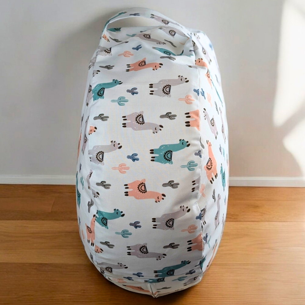 Meditation cushion featuring llamas and cacti on hardwood floor