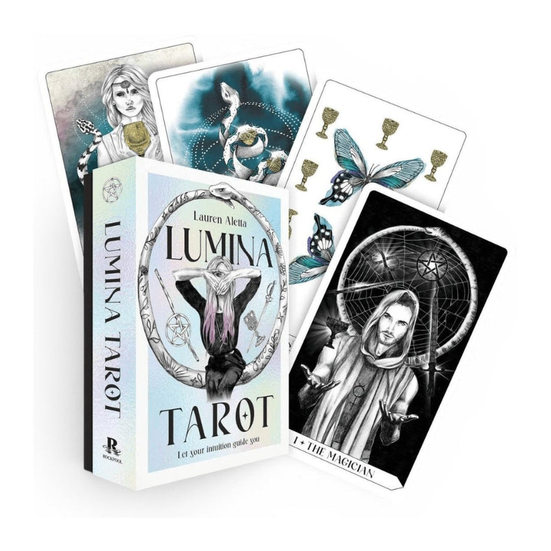 Lumina Tarot deck box by Lauren Aletta, with The Magician and three more cards