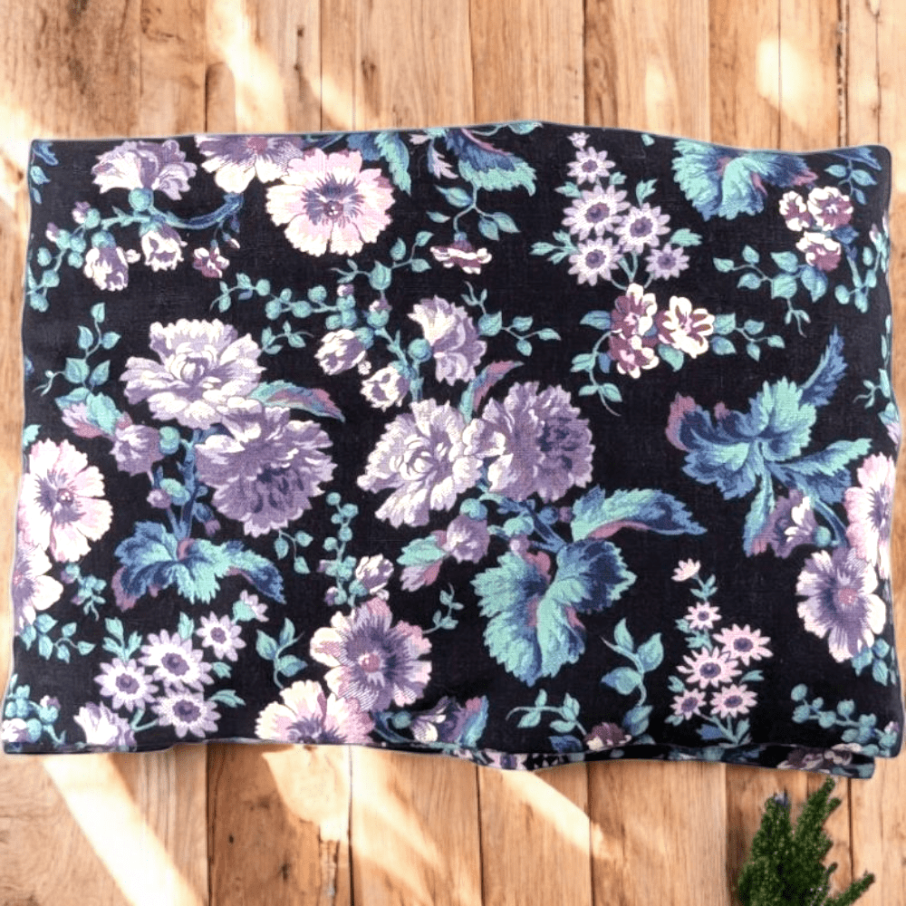 Flaxseed-filled neck wrap with soft floral pattern
