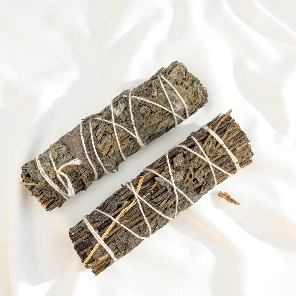 Two mugwort bundles tied with string on a white background available at Barrie Crystal Store