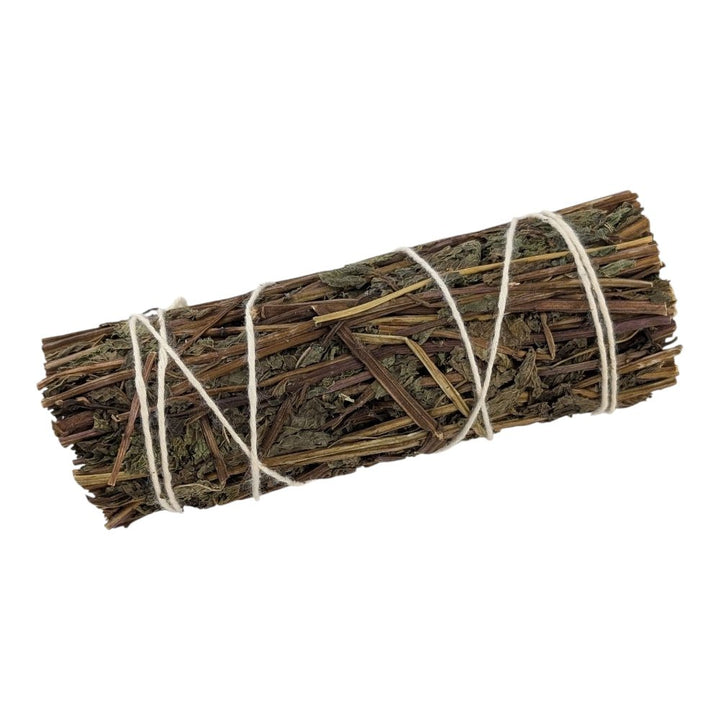 Bundled sticks tied with twine on a white background sourced by canadian online crystal store