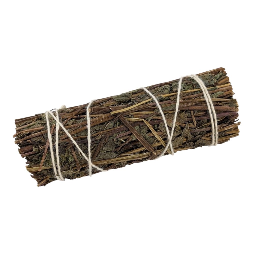 Bundled sticks tied with twine on a white background sourced by canadian online crystal store