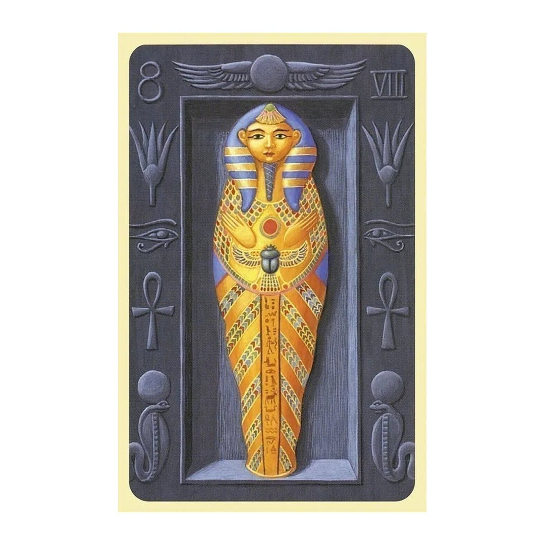 Card 8 from the Mystical Lenormand, showing a golden sarcophagus