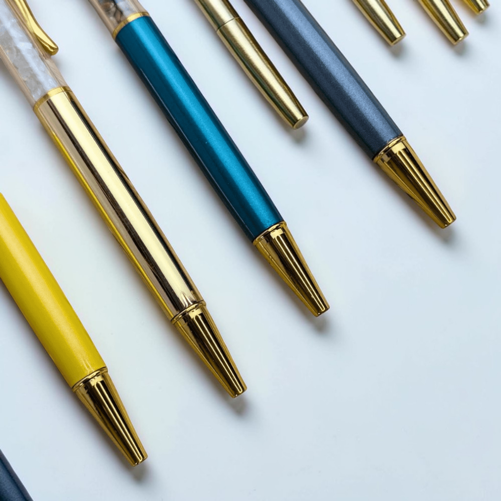 Close-up of Crystal Infused Pens with gold clip details