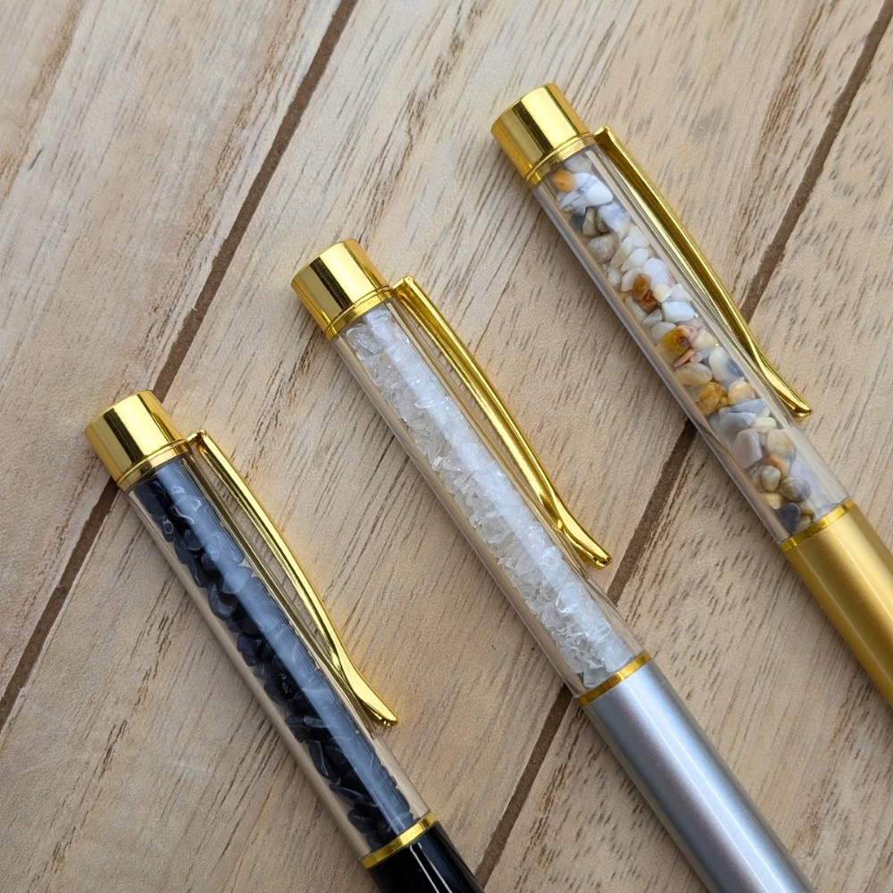 Close-up of Crystal Infused Pens with gold clip details