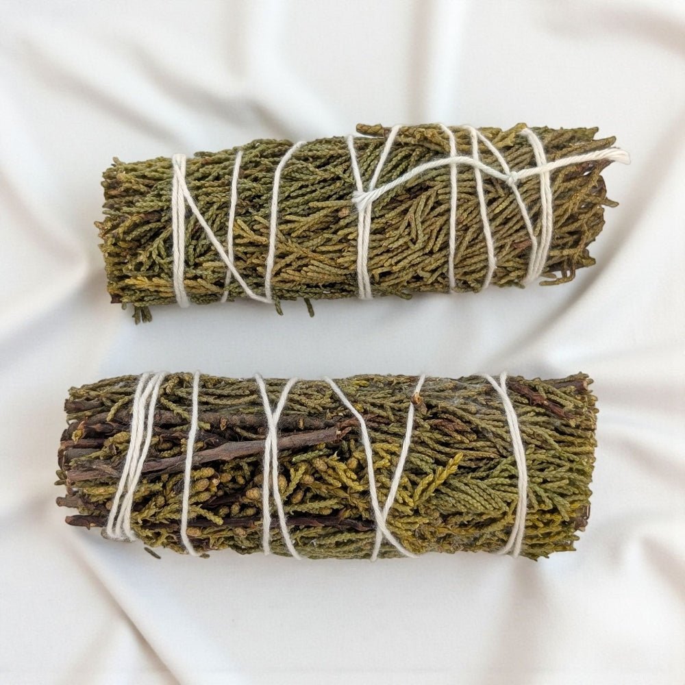 Two pure juniper bundle for protection and cleansing tied with twine on a white background available at zen collection metaphysical crystal store